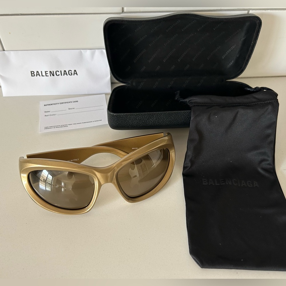 BALENCIAGA gold cat eye sunglasses. Brand new with authenticity card